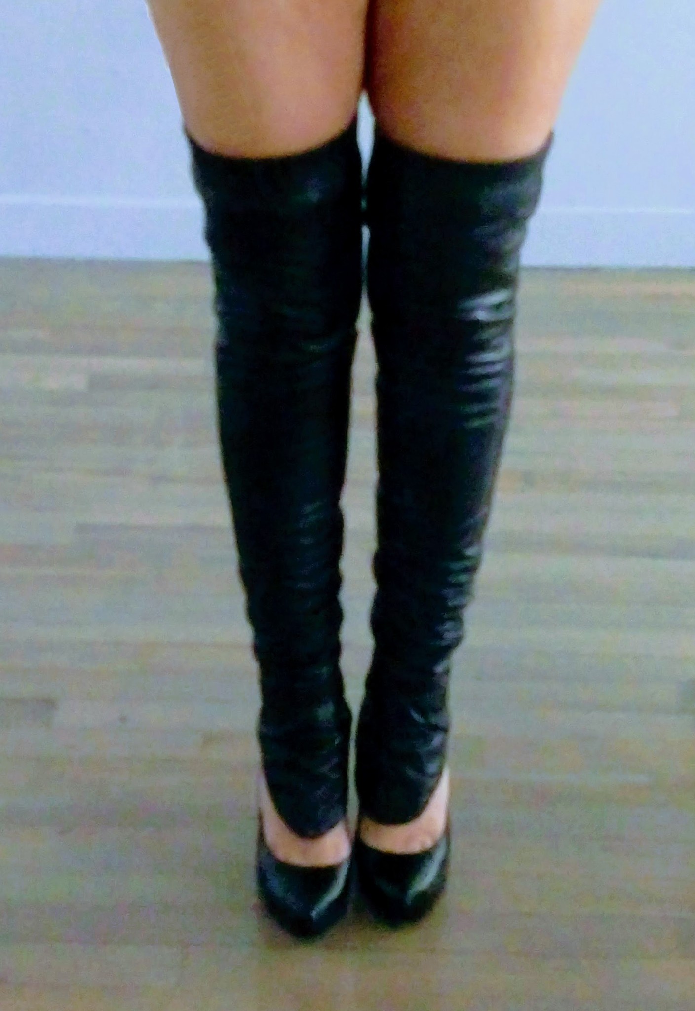 Leather leg warmers styled with stiletto heels