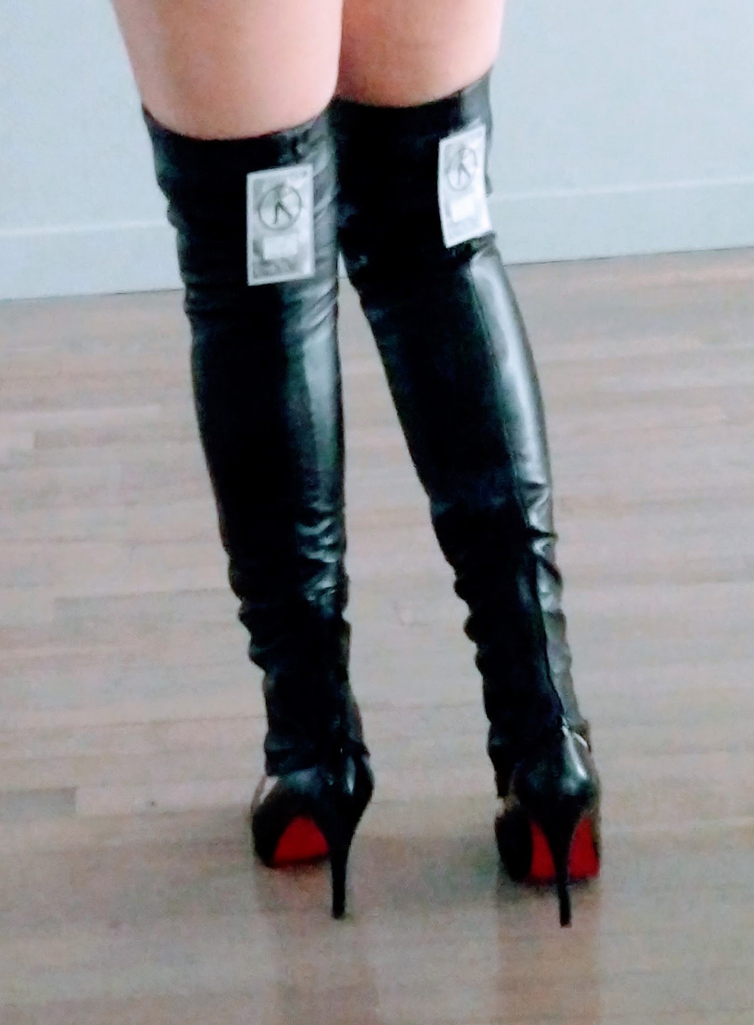 Leather leg warmers with mini dress